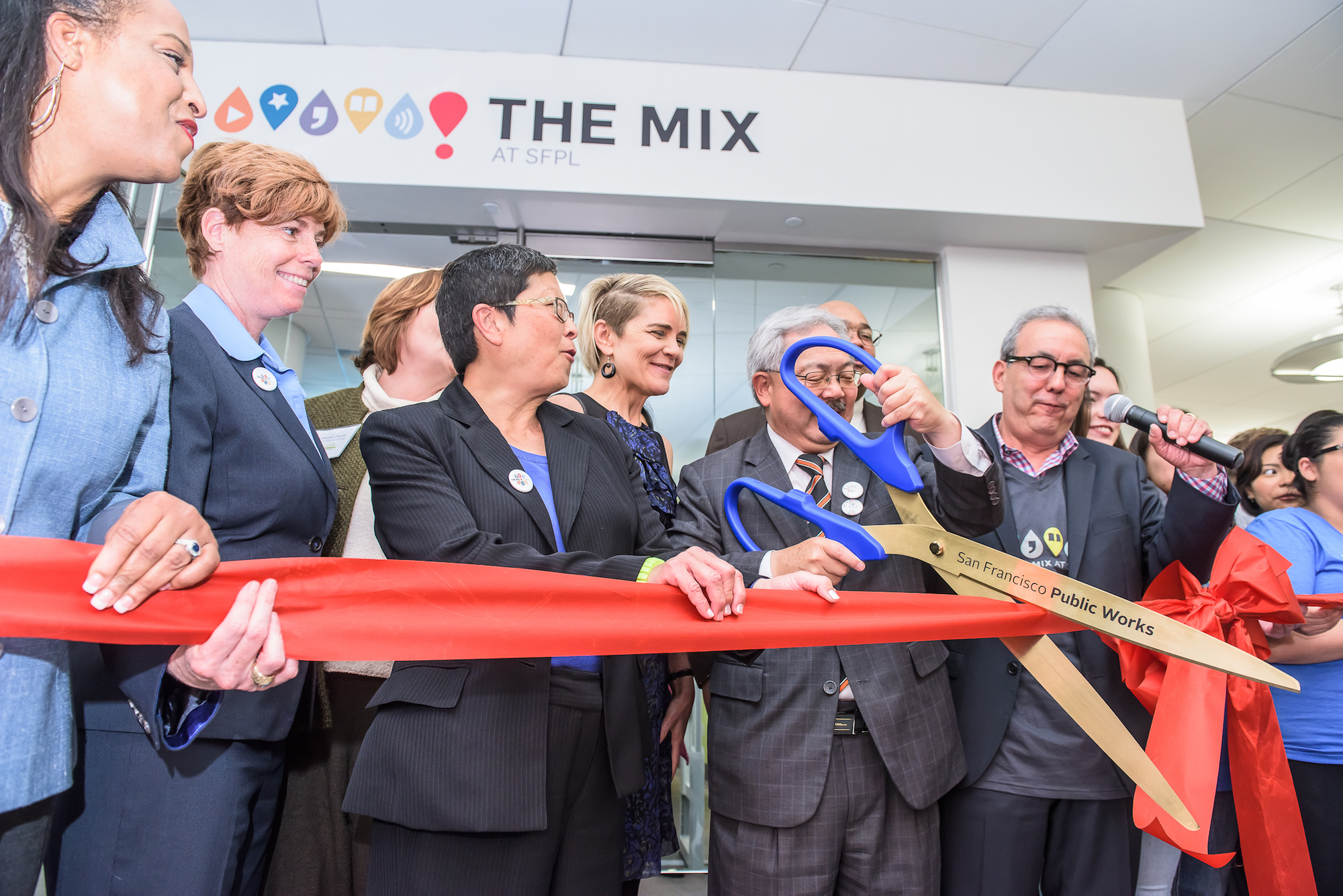 Ribbon cutting at SFPL